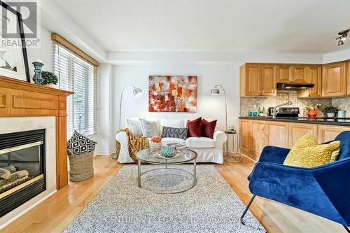 1098 Carding Mill Place, Mississauga, ON - Indoor Photo Showing Living Room With Fireplace