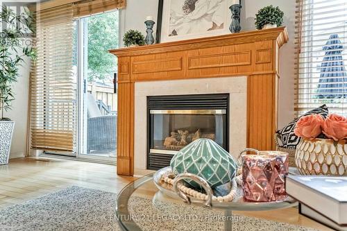 1098 Carding Mill Place, Mississauga, ON - Indoor Photo Showing Living Room With Fireplace