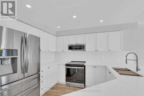 254 Wildgrass Road, Mississauga, ON - Indoor Photo Showing Kitchen With Upgraded Kitchen