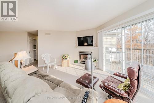 6 Knotty Pine Trail, Huntsville, ON - Indoor Photo Showing Living Room With Fireplace