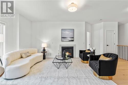 4 Santa Barbara Lane, Halton Hills, ON - Indoor Photo Showing Living Room With Fireplace