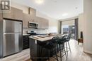 602 - 102 Grovewood Common Crescent, Oakville, ON  - Indoor Photo Showing Kitchen With Stainless Steel Kitchen 