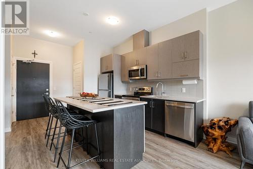 602 - 102 Grovewood Common Crescent, Oakville, ON - Indoor Photo Showing Kitchen With Stainless Steel Kitchen