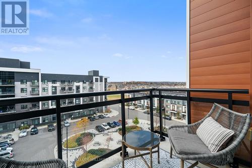 602 - 102 Grovewood Common Crescent, Oakville, ON - Outdoor With Balcony With Exterior