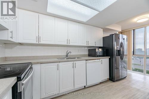 407 - 21 Markbrook Lane, Toronto, ON - Indoor Photo Showing Kitchen With Double Sink