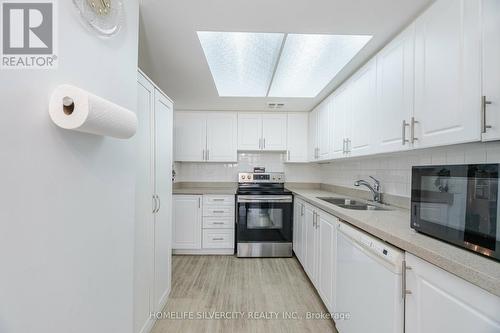 407 - 21 Markbrook Lane, Toronto, ON - Indoor Photo Showing Kitchen With Double Sink