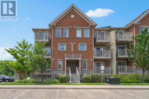 23 - 5625 Oscar Peterson Boulevard, Mississauga, ON - Outdoor With Balcony With Facade