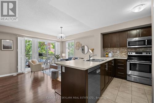 23 - 5625 Oscar Peterson Boulevard, Mississauga, ON - Indoor Photo Showing Kitchen With Double Sink