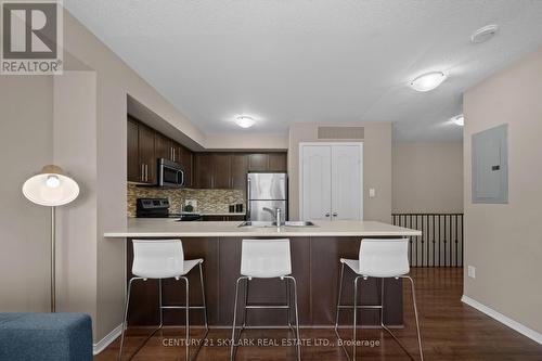 23 - 5625 Oscar Peterson Boulevard, Mississauga, ON - Indoor Photo Showing Kitchen With Upgraded Kitchen