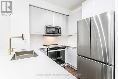 1705 - 220 Burnhamthorpe Road, Mississauga, ON - Indoor Photo Showing Kitchen With Double Sink With Upgraded Kitchen