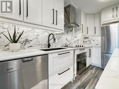 210 - 200 Manitoba Street, Toronto, ON - Indoor Photo Showing Kitchen With Upgraded Kitchen