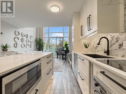 210 - 200 Manitoba Street, Toronto, ON - Indoor Photo Showing Kitchen With Upgraded Kitchen