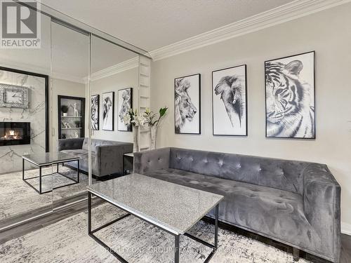 210 - 200 Manitoba Street, Toronto, ON - Indoor Photo Showing Living Room With Fireplace