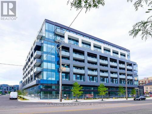 504 - 4208 Dundas Street W, Toronto, ON - Outdoor With Balcony With Facade