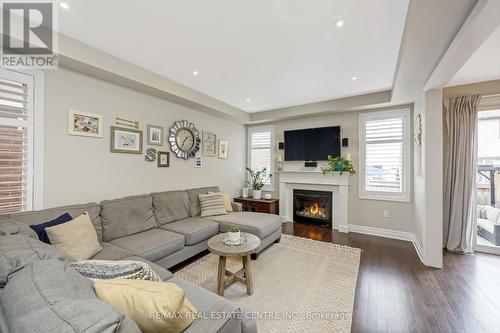 1166 Biason Circle, Milton, ON - Indoor Photo Showing Living Room With Fireplace