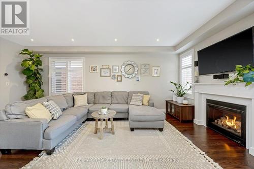 1166 Biason Circle, Milton, ON - Indoor Photo Showing Living Room With Fireplace