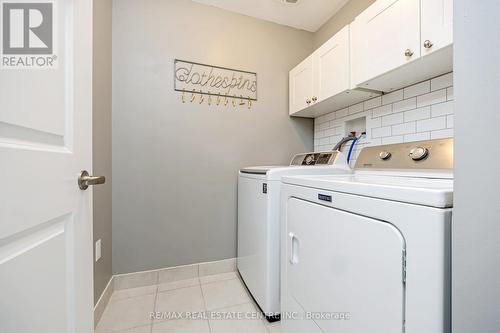 1166 Biason Circle, Milton, ON - Indoor Photo Showing Laundry Room