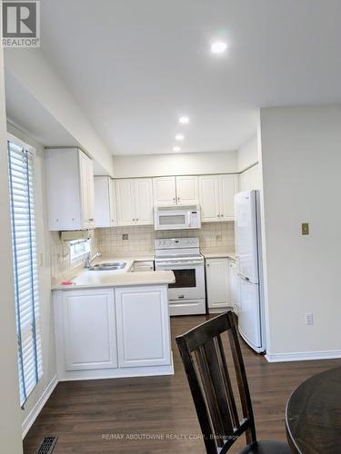 6 - 2315 Westoak Trail, Oakville, ON - Indoor Photo Showing Kitchen With Double Sink