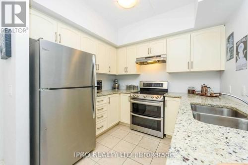 116 - 630 Sauve Street, Milton, ON - Indoor Photo Showing Kitchen With Stainless Steel Kitchen With Double Sink