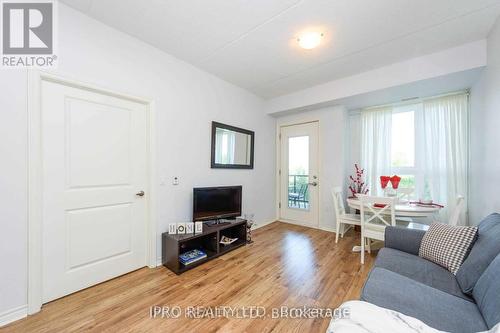 116 - 630 Sauve Street, Milton, ON - Indoor Photo Showing Living Room