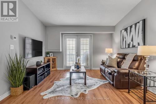 408 - 1340 Main Street E, Milton, ON - Indoor Photo Showing Living Room