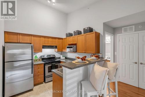 408 - 1340 Main Street E, Milton, ON - Indoor Photo Showing Kitchen