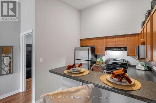 408 - 1340 Main Street E, Milton, ON - Indoor Photo Showing Kitchen