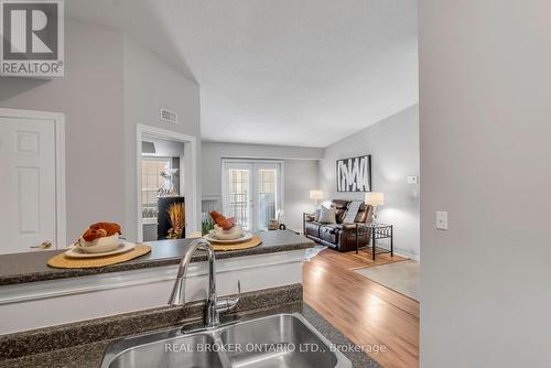 408 - 1340 Main Street E, Milton, ON - Indoor Photo Showing Kitchen With Double Sink