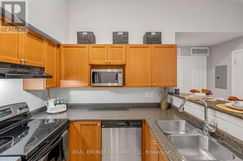 408 - 1340 Main Street E, Milton, ON - Indoor Photo Showing Kitchen With Double Sink