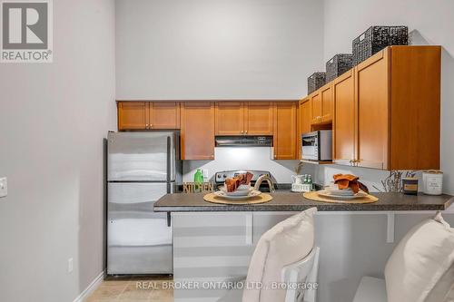 408 - 1340 Main Street E, Milton, ON - Indoor Photo Showing Kitchen