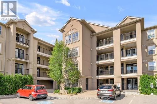 408 - 1340 Main Street E, Milton, ON - Outdoor With Balcony With Facade