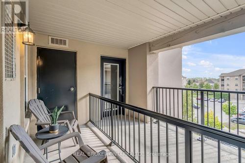 408 - 1340 Main Street E, Milton, ON - Outdoor With Balcony With Exterior