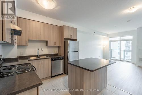 723 - 2486 Old Bronte Road, Oakville, ON - Indoor Photo Showing Kitchen With Stainless Steel Kitchen With Double Sink