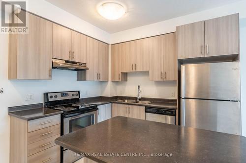 723 - 2486 Old Bronte Road, Oakville, ON - Indoor Photo Showing Kitchen With Stainless Steel Kitchen With Double Sink With Upgraded Kitchen