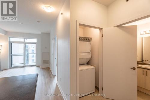 723 - 2486 Old Bronte Road, Oakville, ON - Indoor Photo Showing Laundry Room