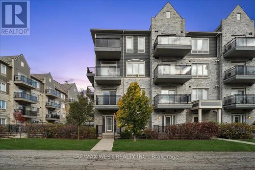 110 - 3075 Thomas Street, Mississauga, ON - Outdoor With Balcony With Facade