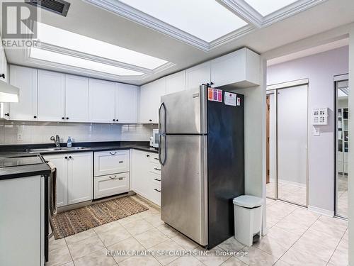 306 - 21 George Street, Aurora, ON - Indoor Photo Showing Kitchen With Stainless Steel Kitchen With Double Sink