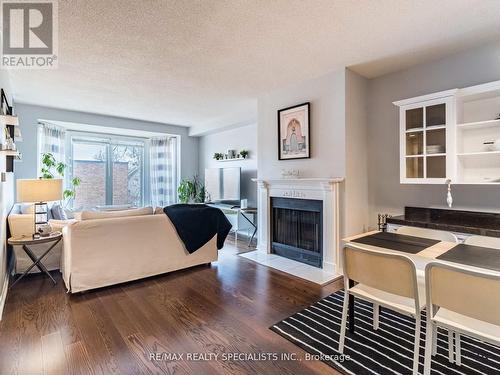 306 - 21 George Street, Aurora, ON - Indoor Photo Showing Living Room With Fireplace