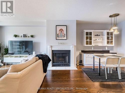 306 - 21 George Street, Aurora, ON - Indoor Photo Showing Living Room With Fireplace