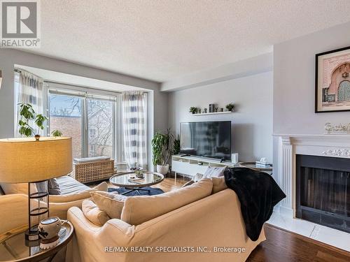 306 - 21 George Street, Aurora, ON - Indoor Photo Showing Living Room With Fireplace