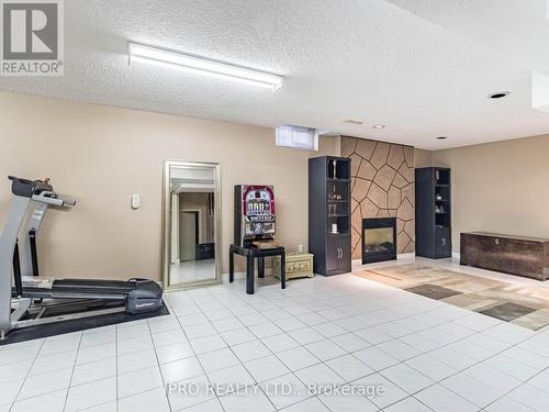 54 Embassy Drive, Vaughan, ON - Indoor Photo Showing Gym Room With Fireplace