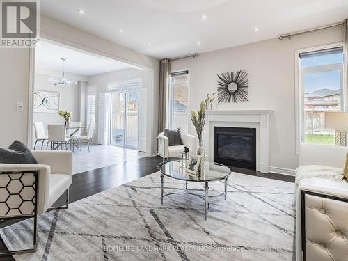 94 Barrow Avenue, Bradford West Gwillimbury, ON - Indoor Photo Showing Living Room With Fireplace