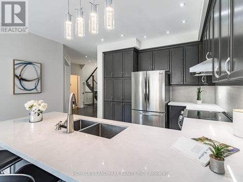 94 Barrow Avenue, Bradford West Gwillimbury, ON - Indoor Photo Showing Kitchen With Stainless Steel Kitchen With Double Sink With Upgraded Kitchen