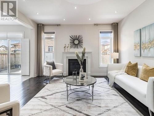 94 Barrow Avenue, Bradford West Gwillimbury, ON - Indoor Photo Showing Living Room With Fireplace