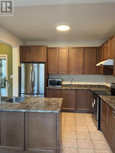 125 Vera Lynn Crescent, Whitchurch-Stouffville, ON - Indoor Photo Showing Kitchen With Double Sink