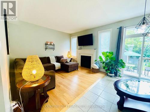 86 Sydie Lane, New Tecumseth, ON - Indoor Photo Showing Living Room With Fireplace