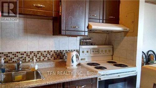 706 - 1950 Kennedy Road, Toronto, ON - Indoor Photo Showing Kitchen