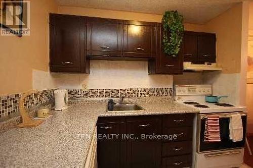 706 - 1950 Kennedy Road, Toronto, ON - Indoor Photo Showing Kitchen