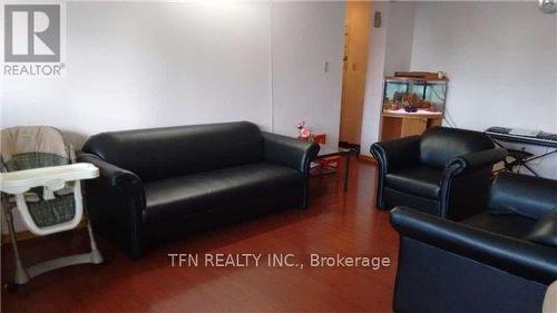 706 - 1950 Kennedy Road, Toronto, ON - Indoor Photo Showing Living Room