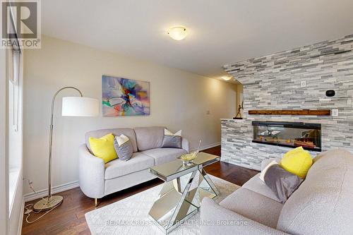 34 Bluegill Crescent, Whitby, ON - Indoor Photo Showing Living Room With Fireplace